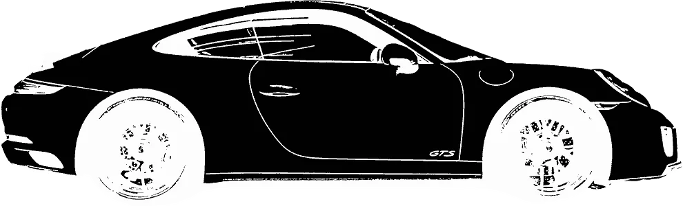 Side view of a car drifting across